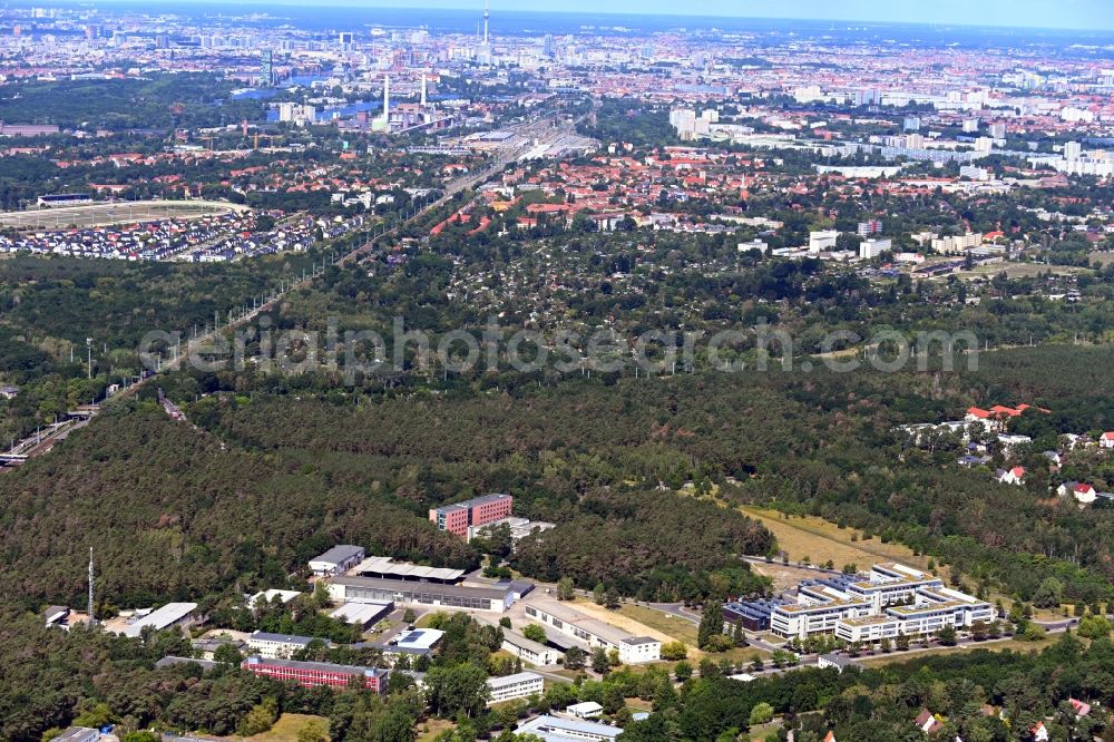 Berlin from above - View of clouds surrounding the campus of commercial area Wuhlheide Innovation Park in Berlin - Koepenick