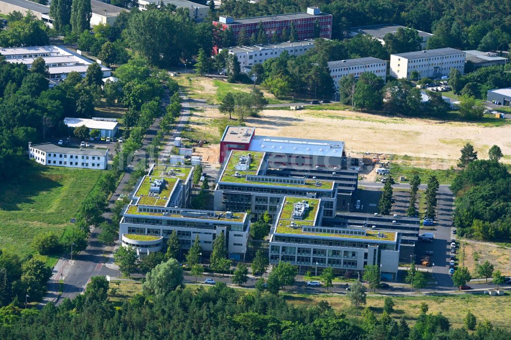Aerial image Berlin - View of clouds surrounding the campus of commercial area Wuhlheide Innovation Park in Berlin - Koepenick