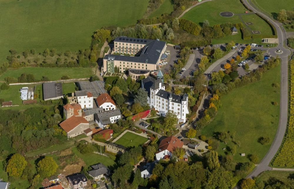 Perl OT Nennig from the bird's eye view: Casino Schloss Berg in Renaissance castle in the Upper Moselle Nennig in Saarland