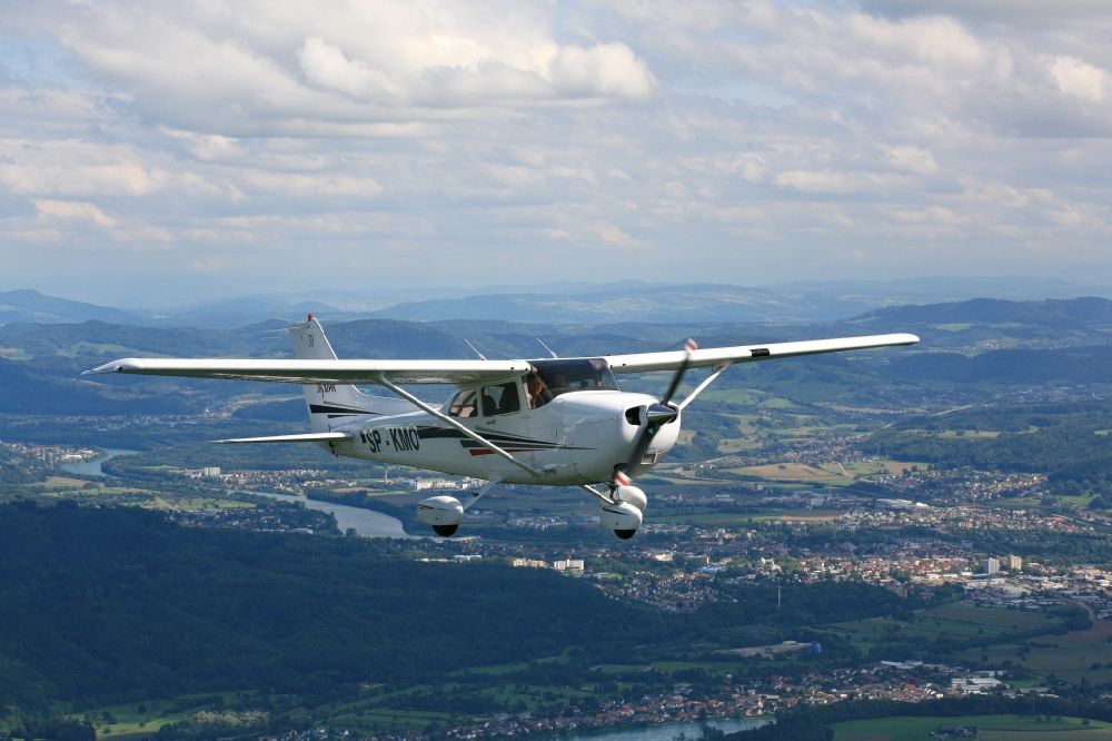 Aerial image Bad Säckingen - Light aircraft Cessna 172 call sign SP-KMO over the landscape close to Bad Saeckingen in the state of Baden-Wuerttemberg