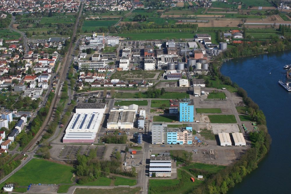Grenzach-Wyhlen from above - Industrial and commercial area of the companies BASF, Roche and DSM Nutritional Products in Grenzach-Wyhlen in the state Baden-Wuerttemberg, Germany