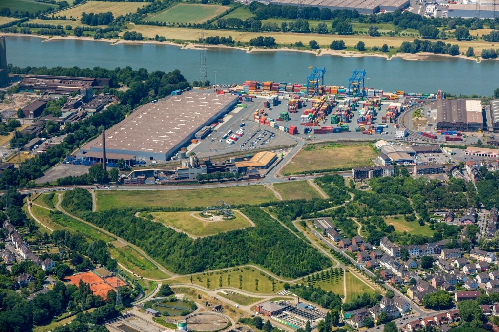 Duisburg from above - Building complex and grounds of DIT Duisburg Intermodal Terminal in the logistics center logport on the left riverbank of the Rhine in Duisburg in the state of North Rhine-Westphalia. The center is part of the harbour duisport and located in the Rheinhausen part of Duisburg