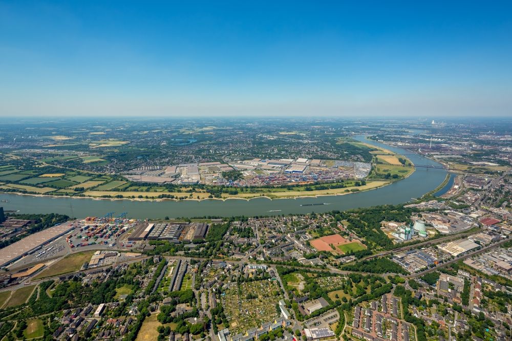 Duisburg from the bird's eye view: Building complex and grounds of DIT Duisburg Intermodal Terminal in the logistics center logport on the left riverbank of the Rhine in Duisburg in the state of North Rhine-Westphalia. The center is part of the harbour duisport and located in the Rheinhausen part of Duisburg