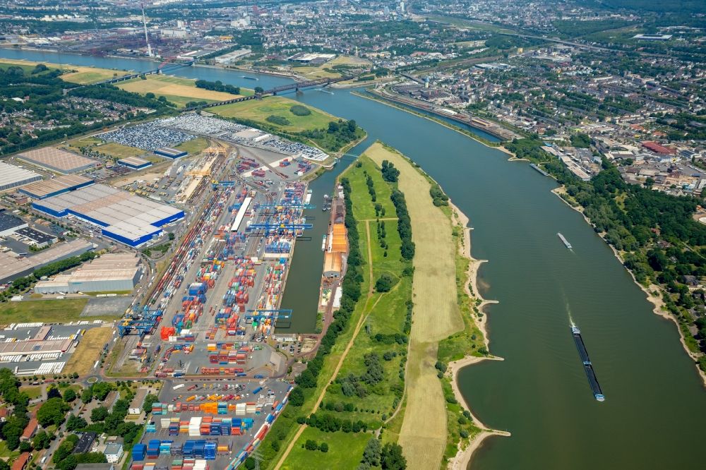 Aerial image Duisburg - Building complex and grounds of DIT Duisburg Intermodal Terminal in the logistics center logport on the left riverbank of the Rhine in Duisburg in the state of North Rhine-Westphalia. The center is part of the harbour duisport and located in the Rheinhausen part of Duisburg