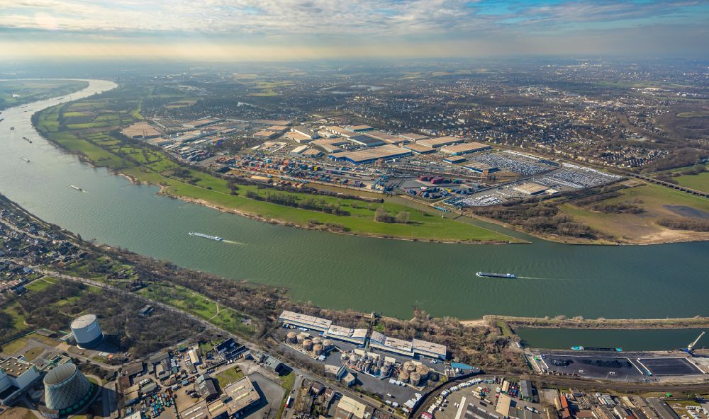 Aerial photograph Duisburg - Building complex and grounds of DIT Duisburg Intermodal Terminal in the logistics center logport on the left riverbank of the Rhine in Duisburg in the state of North Rhine-Westphalia. The center is part of the harbour duisport and located in the Rheinhausen part of Duisburg