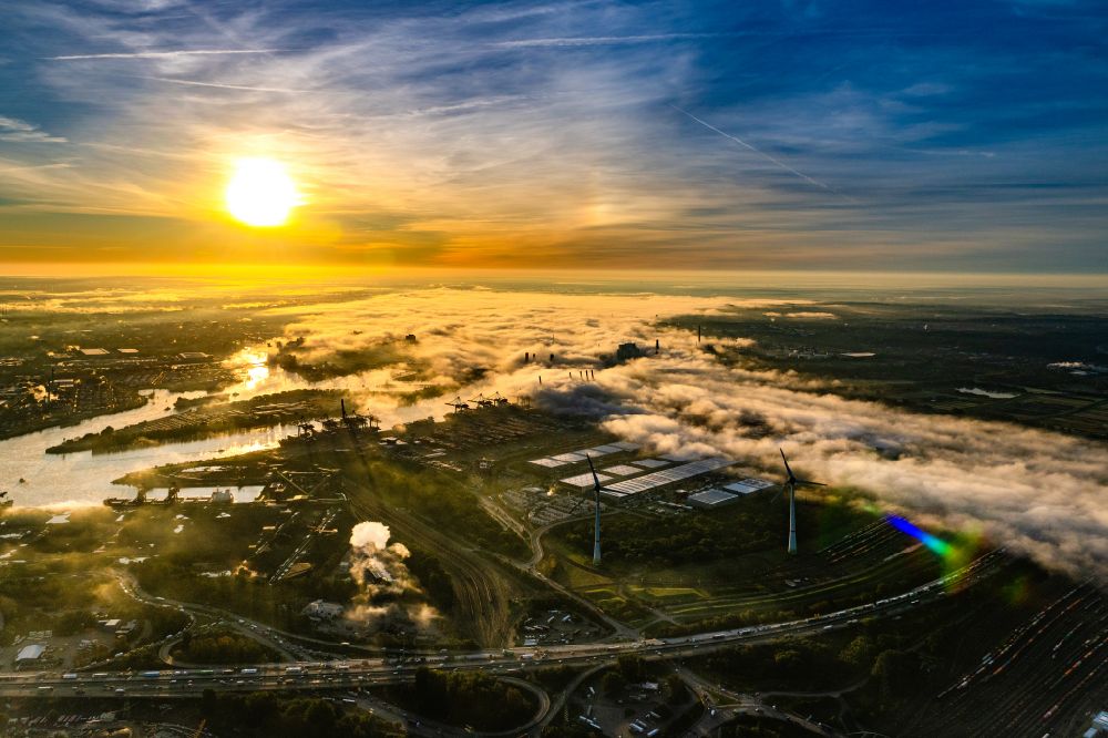 Aerial photograph Hamburg - Container terminal HHLA Container Terminal Altenwerder (CTA) in the fog at sunrise on the banks of the Elbe in the Altenwerder district in Hamburg