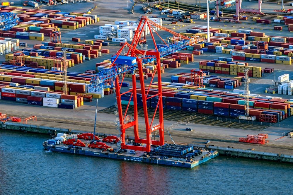 Aerial image Hamburg - Container and container ships at berth HHLA Logistics Container Terminal Burchhardkai and Walter Hofer Euro Gate Container Terminal in the Port of Hamburg harbor in Hamburg