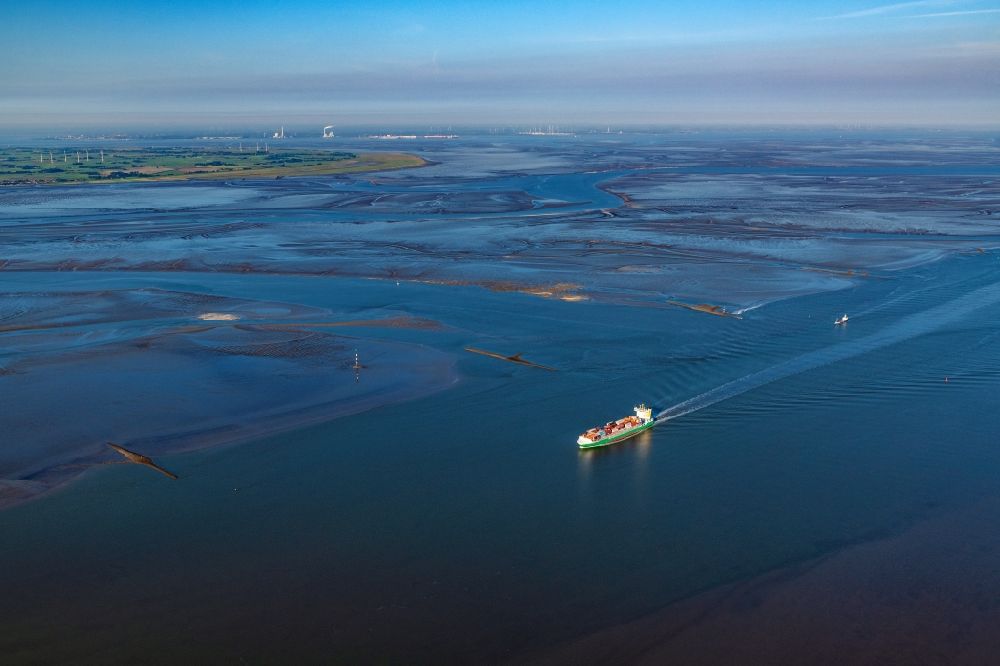 Wurster Nordseeküste from above - Container ship on the Outer Weser in the Wadden Sea in Wurster North Sea Coast in the state Lower Saxony, Germany