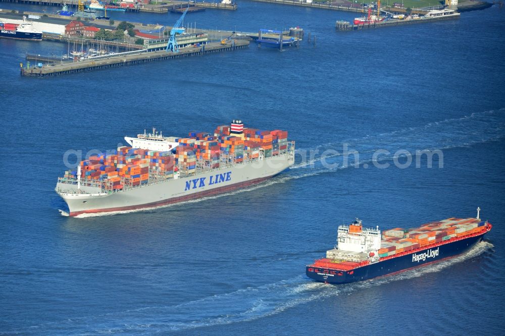 Aerial photograph Cuxhaven - Container ship - the cargo shipping company NYK Line NYK Hercules GmbH in driving off the North Sea coast near Cuxhaven in Lower Saxony