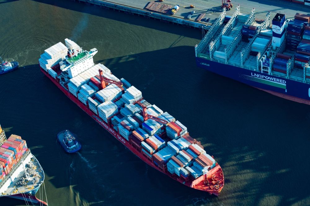 Hamburg from the bird's eye view: Container ship Texas Triumph at Burchardkai in the harbor in the district Waltershof in Hamburg, Germany