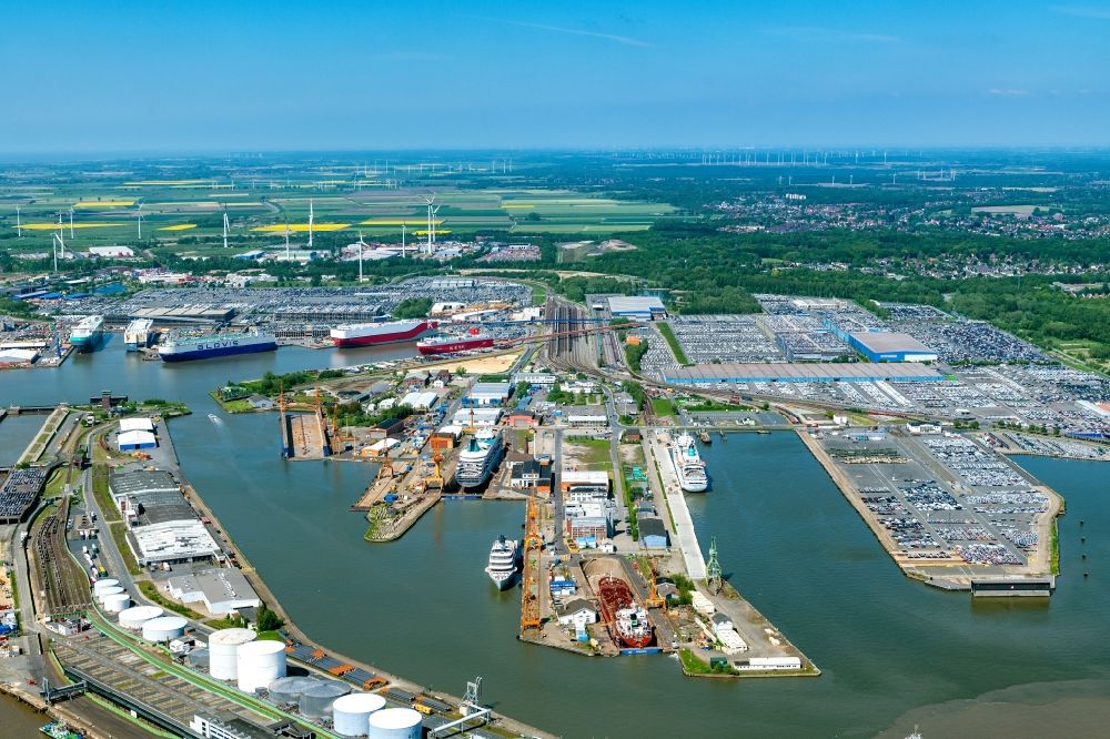 Bremerhaven from the bird's eye view: Container Terminal in the port of the international port mit Autoschiffen, Containerhafen and Lagerhallen in Bremerhaven in the state Bremen, Germany