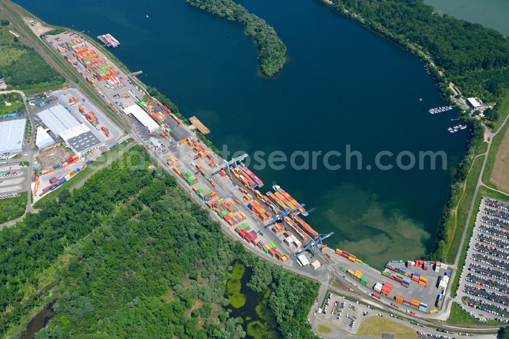 Aerial photograph Wörth am Rhein - Container terminal in the container port of Contargo Woerth-Karlsruhe GmbH on the lake of the Landeshafen in the district Industriegebiet Woerth-Oberwald in Woerth am Rhein in the state Rhineland-Palatinate, Germany