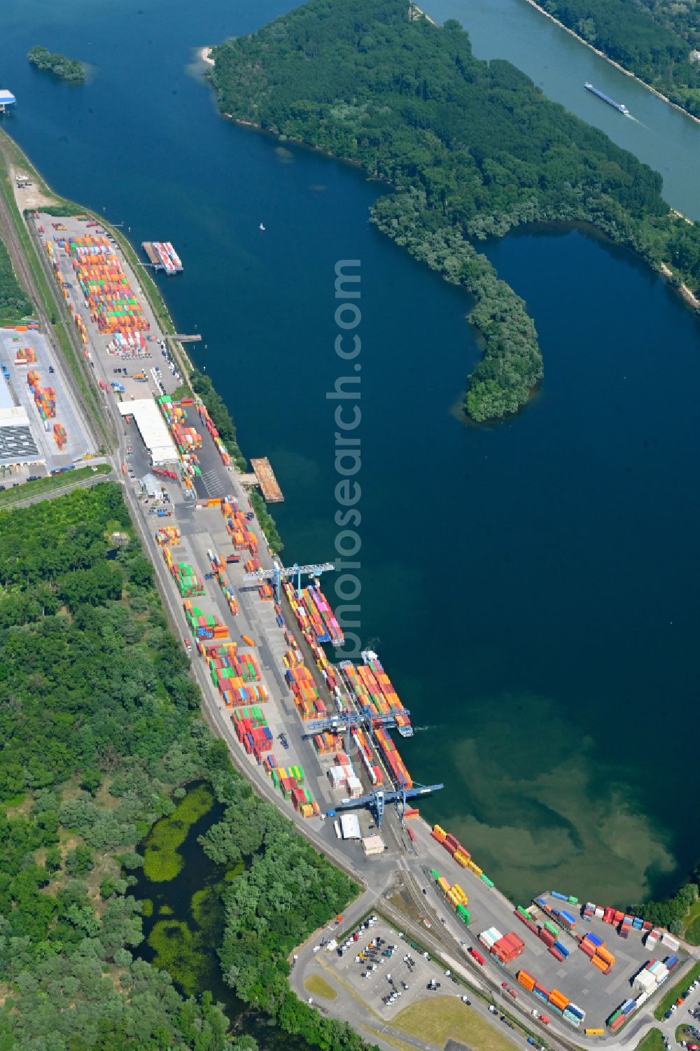 Wörth am Rhein from above - Container terminal in the container port of Contargo Woerth-Karlsruhe GmbH on the lake of the Landeshafen in the district Industriegebiet Woerth-Oberwald in Woerth am Rhein in the state Rhineland-Palatinate, Germany
