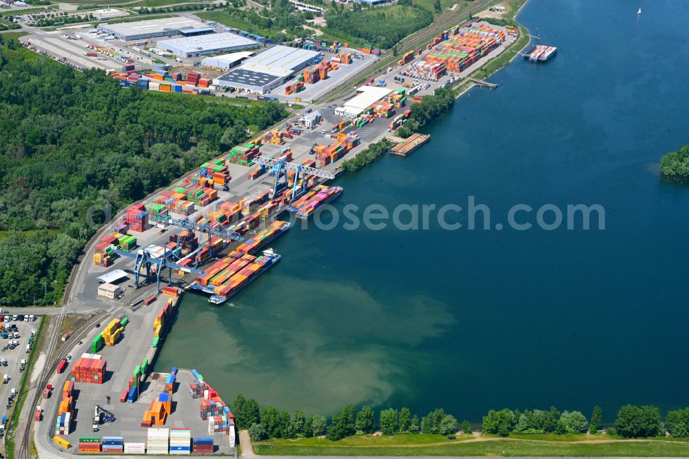 Wörth am Rhein from the bird's eye view: Container terminal in the container port of Contargo Woerth-Karlsruhe GmbH on the lake of the Landeshafen in the district Industriegebiet Woerth-Oberwald in Woerth am Rhein in the state Rhineland-Palatinate, Germany