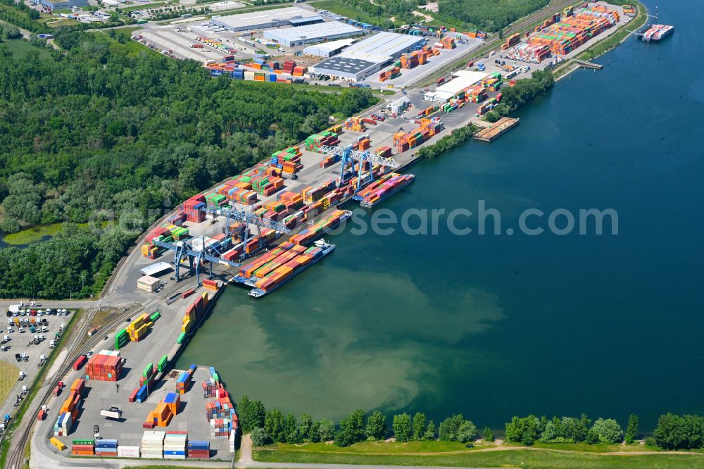 Aerial image Wörth am Rhein - Container terminal in the container port of Contargo Woerth-Karlsruhe GmbH on the lake of the Landeshafen in the district Industriegebiet Woerth-Oberwald in Woerth am Rhein in the state Rhineland-Palatinate, Germany
