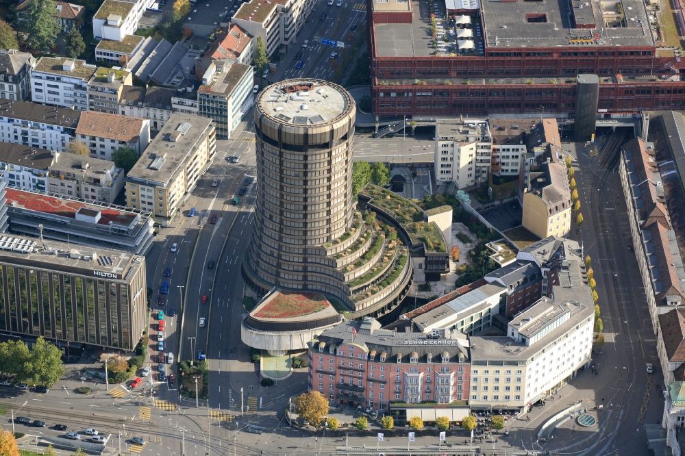 Basel from above - The round tower of the Bank for International Settlements BIS in Basel, Switzerland is an impressive skyscraper and dominates the cityscape at Basel SBB train station