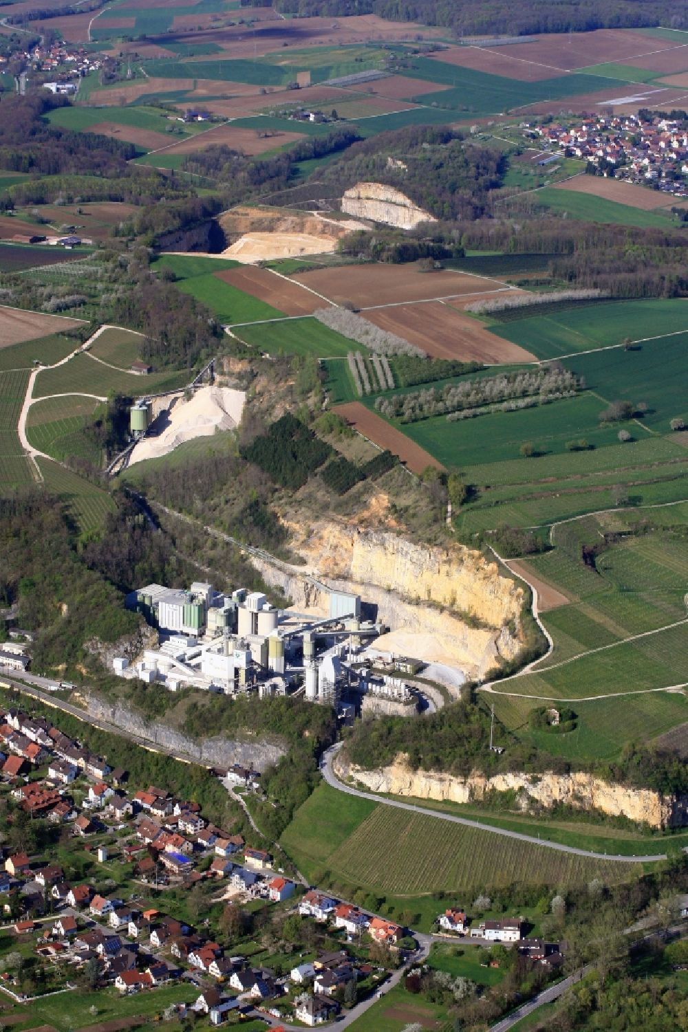 Efringen-Kirchen from above - The limestone mining area of Heidelberger Cement in the district Istein from Efringen-Kirchen in the state of Baden-Wuerttemberg
