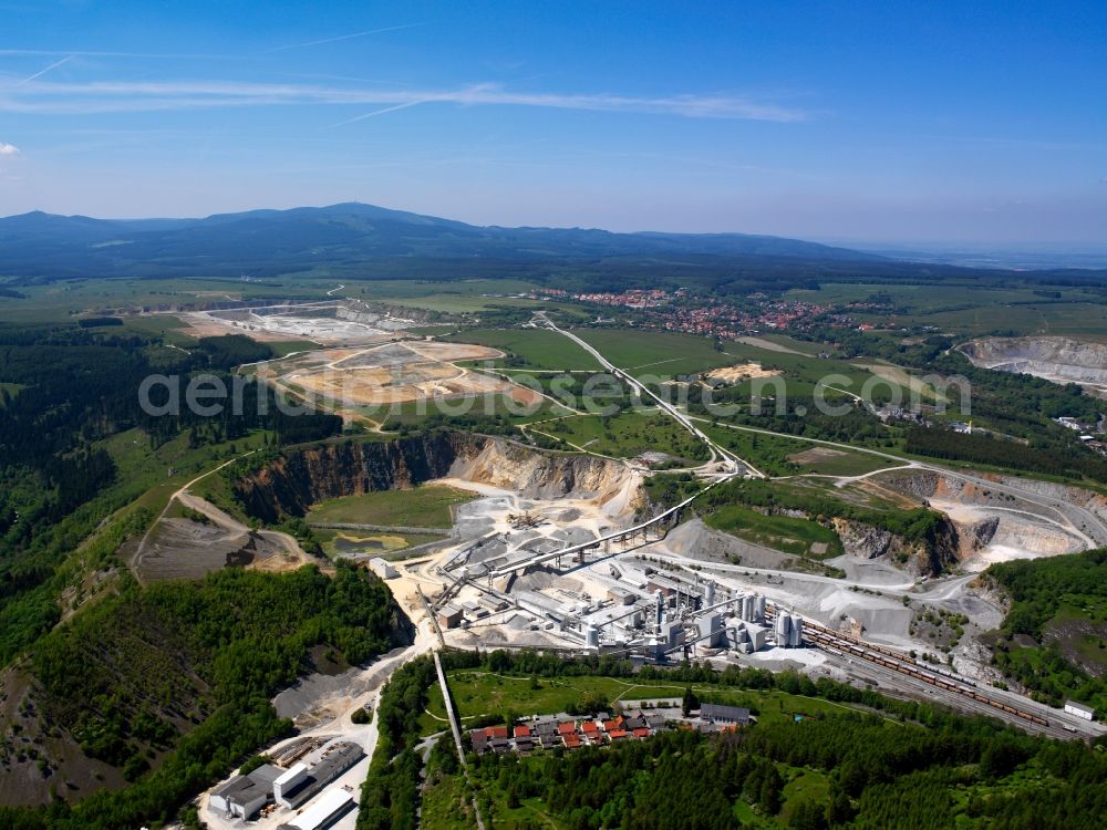 Oberharz am Brocken from above - The lime works and plant in the Rübeland part of Oberharz am Brocken in the state of Saxony-Anhalt. The works are part of the Fels works company. The site is one of the largest in Germany. It includes the most modern oven technologies that allow production of approx. 600 000 tons of lime each year