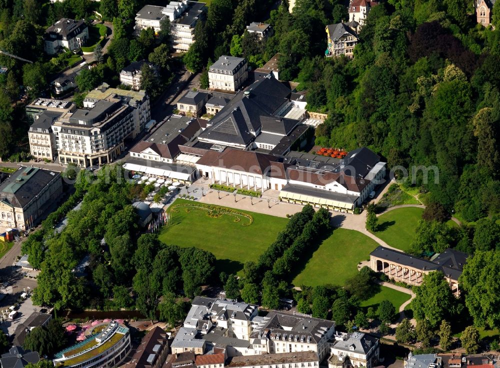 Baden-Baden from above - The health resort and cure park in the city of Baden-Baden in the state of Baden-Württemberg. The building was design in classicistic fashion and is today used as event site and concert venue. The Kurhaus is surrounded by historical buildings, the park and woods