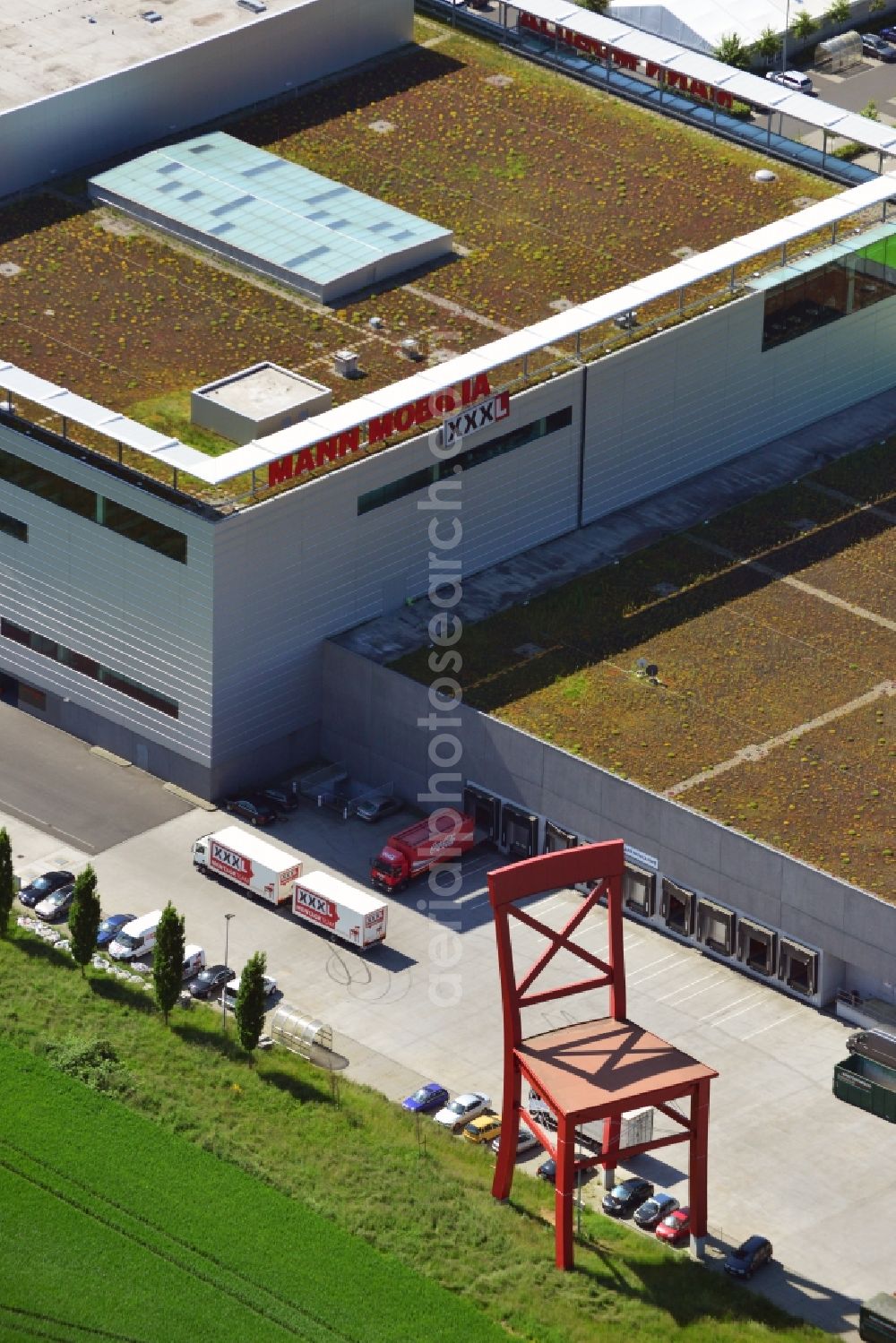 Aerial image Eschborn - The Mann Mobilia XXXL furniture store in Eschborn in the metropolitan area of Frankfurt am Main in the state of Hessen. View of the red chair, the trade mark of the XXXL furniture store chain