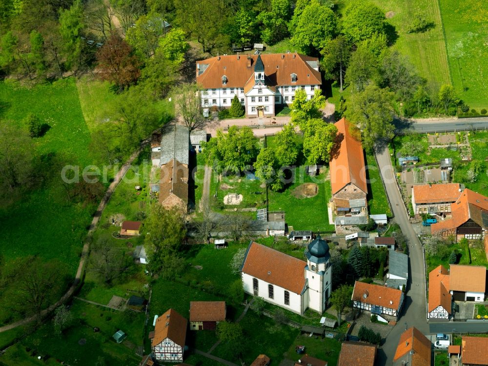 Stadtlengsfeld from the bird's eye view: The Upper Castle in the Gehaus part of Stadtlengsfeld in the state of Thuringia. The upper castle was built 1710-1716 and includes a large ballroom. It is located on the Eastern end of the public park and behind a little parochial church