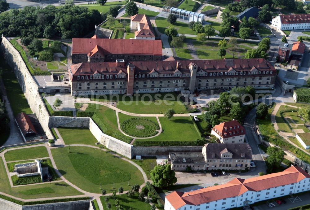 Aerial image Erfurt - The defense barracks located on the site of the former citadel Petersberg in Erfurt in Thuringia. On the fortress today have different authorities are situated such as the Thuringian State Office for Heritage and Archaeology in the U-shaped Atilleriekaserne. Before defense barracks the Schirmeisterhaus, the city cuisine and the Lower Barracks are seen. Left on the bastion Franz is the entrance to War powder magazine