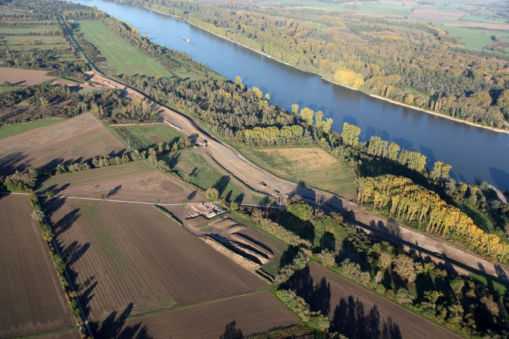 Dienheim from above - Diking measures at Dienheim in the state of Rhineland-Palatinate. In the section of the left bank of the Rhine near Dienheim the levees are upgraded to protect against flood and partially rebuilt by the Structural and Approval Directorate south