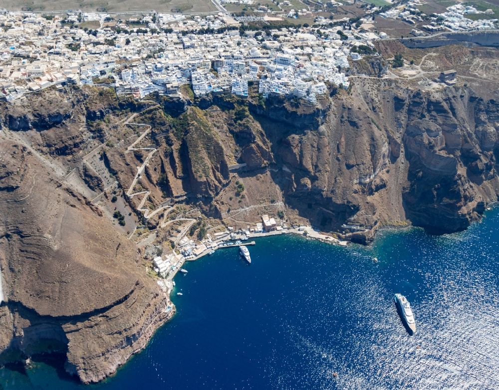 Aerial photograph Santorin - View of the main island of Thira, on the West coast of the archipelago of Santorini in Greece