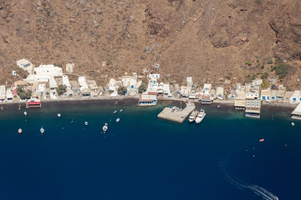 Santorin from the bird's eye view: View of the main island of Thira, on the West coast of the archipelago of Santorini in Greece