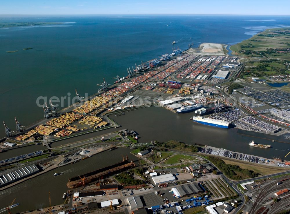 Aerial photograph Bremerhaven - The overseas port in Bremerhaven in the state of Bremen. View of the container terminal compound. The harbour group belongs to the Bremischen Häfen. It is the fourth largest universal harbour in Europe. The three container wharfs in Bremerhaven accumulate to one of the biggest container shipping sites in the world