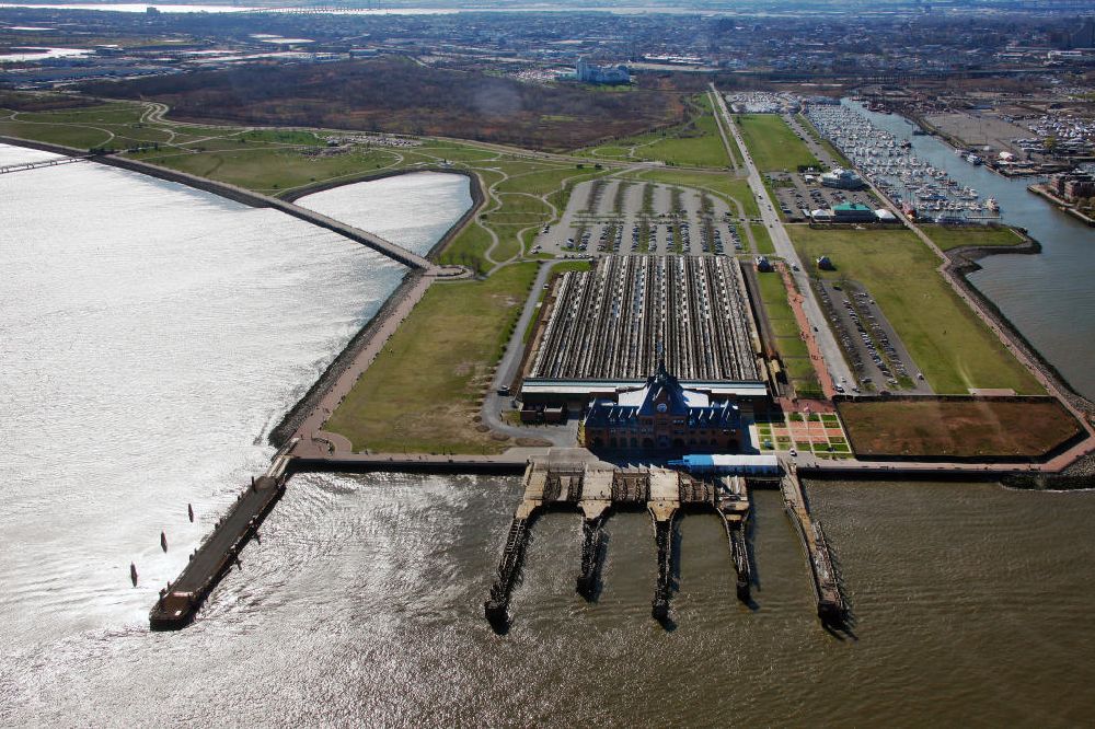 Jersey City from the bird's eye view: View of the former Central Station in New Jersey on the Hudson River in Jersey City. The Communipaw Terminal was built in 1889 and was the first stop for immigrants. Up to 1967 it was in operation and is now part of Liberty State National Park