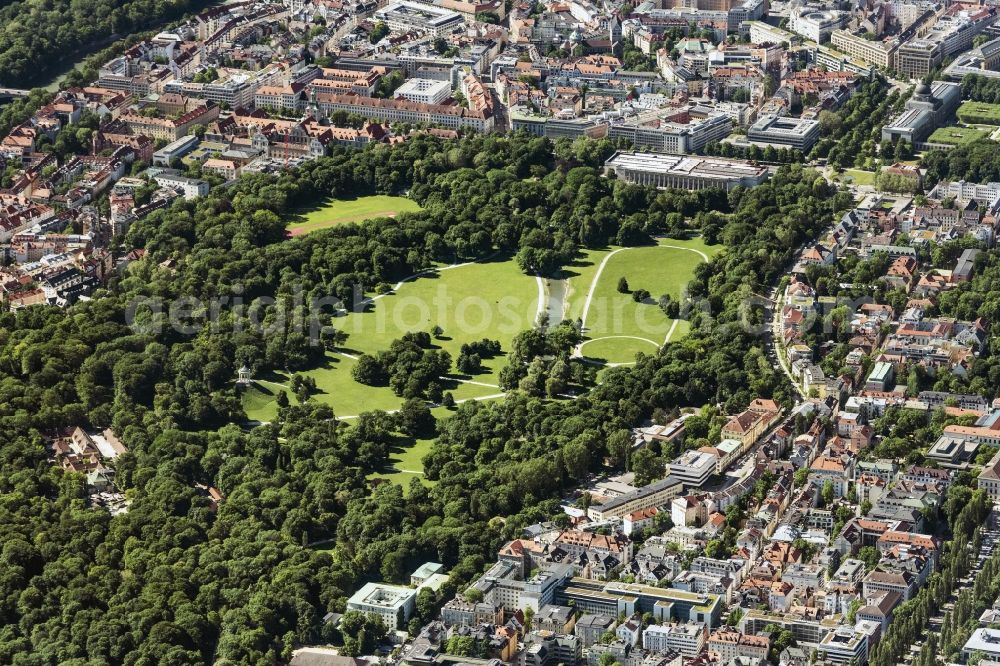 München from above - The leisure area Englischer Garten (English Garden) in Munich in the state of Bavaria. The popular greens and open spaces of the park are mainly used in summer and are administrated by the Bavarian Administration of castles, gardens and lakes. The English Garden is on of the largest inner city parks in the world