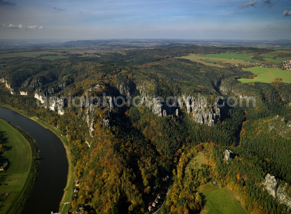 Aerial photograph Stadt Wehlen - The tower is a rock formation with a viewing platform in the Saxon Switzerland on the right bank of the Elbe between the city and Rathen Wehlen. It is one of the most visited tourist attractions in the Saxon Switzerland. From the bastion falls from the narrow rocky reef about 194 meters steeply to the river Elbe. It offers a wide view over the Elbe and the Elbe Sandstone Mountains