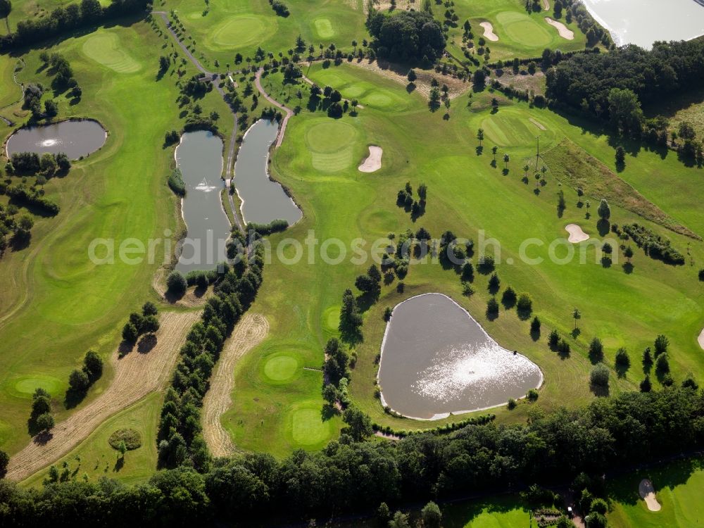 Aerial photograph Börrstadt - The golf club Am Donnersberg near Börrstadt in the state of Rhineland-Palatinate. The course is located on the south part of the mountain and next to the Autobahn A63. It can be used all year and is famous for its integration in the existing landscape. The 18-hole course is location to various tournaments