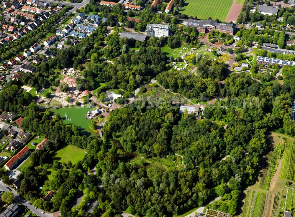 Aerial photograph Hamm - The Maximilianpark in the city district of Hamm-Uentrop in Hamm in the state of Northrhine-Westphalia. It is located on the site of the former mine Maximilian and exists since 1984. Its landmark is the glass elephant, a 40m high sculpture. The park is used as an event location and concert site, it includes a butterfly house, a children's area and a lake