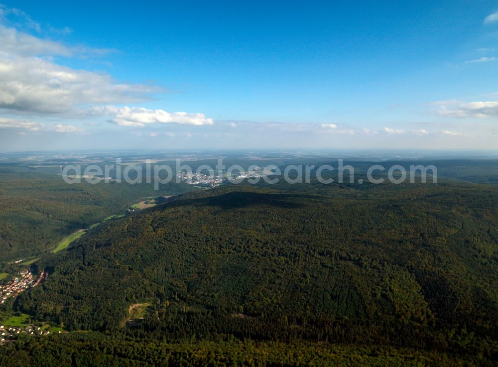 Partenstein from above - The Partensteiner Forest in the Spessart region in the borough of Partenstein in the state of Bavaria. Its highest point is the Weickertshöhe. The Spessart region is a mountain range in Southern Germany in the states of Bavaria and Hesse. The Spessart was used as a royal hunting ground, but today it is mostly important for the local tourism and as a recreational region. The region consists of 2440 square kilometres