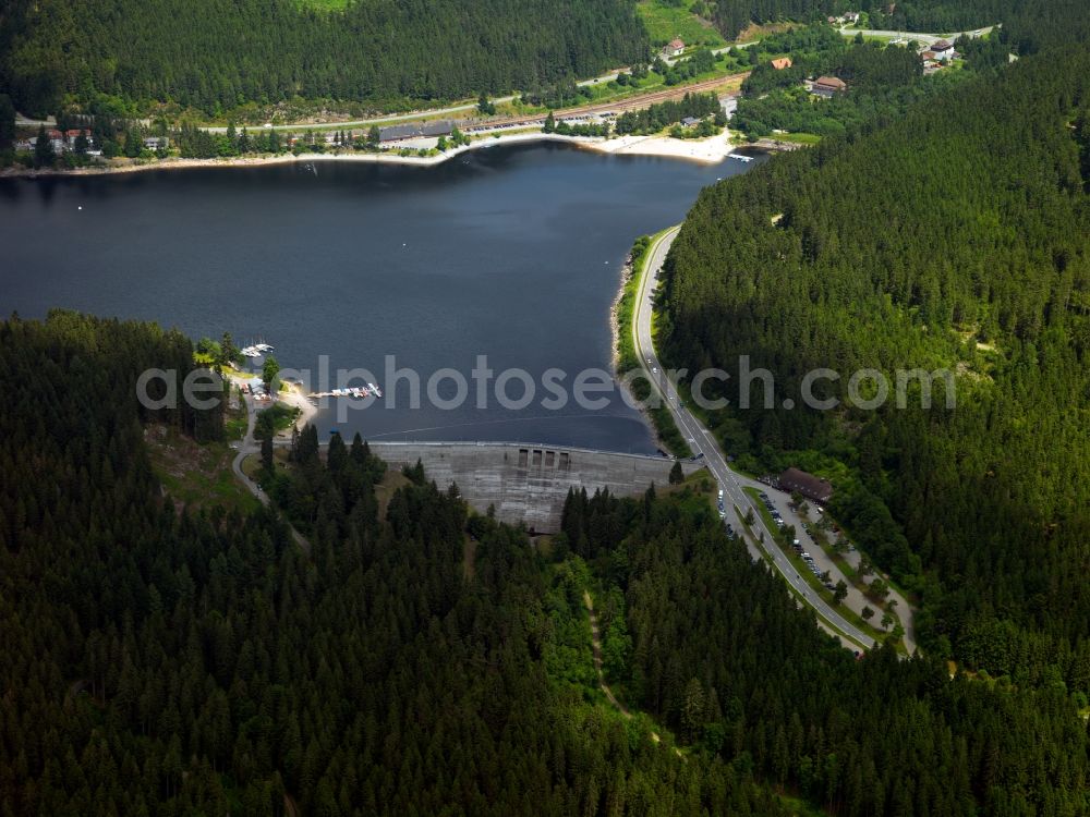 Schluchsee from the bird's eye view: The lake Schluchsee in the county of Schluchsee in the county district of Breisgau-Hochschwarzwald in the state of Baden-Württemberg. The lake is a barrier lake and part of the works group Schluchsee which consists of several water reservoirs in different heights that are connected through pump works. It is the largest lake of the Black Forest area and favoured by swimmers and sailers