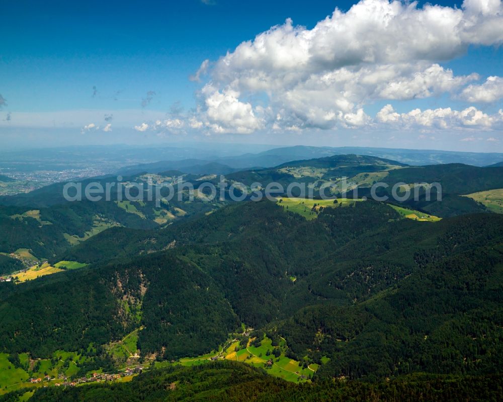Aerial image Münstertal - The Black Forest in the county of Münstertal in the state of Baden-Württemberg. The valley starts in the Breisgau region and leads up to the mountains of the Forest. The Black Forest is Germany's highest and largest connected low mountain range, located in the Sout West of the state of Baden-Württemberg. Today, it is mostly significant for its tourims sites and regions