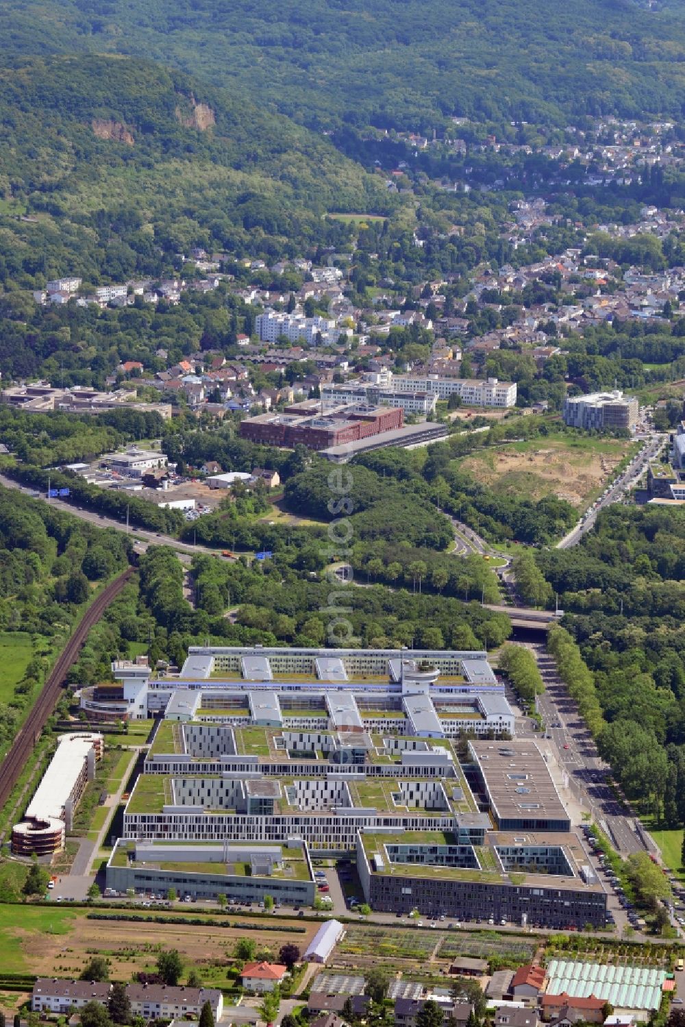 Aerial photograph Bonn - The headquarters of T-Mobile Germany in the Beuel part of the city of Bonn in the state of North Rhine-Westphalia. T-Mobile is part of Telekom Germany and the biggest and one of the most important mobile phone service providers in Germany. View of the company compound from the West