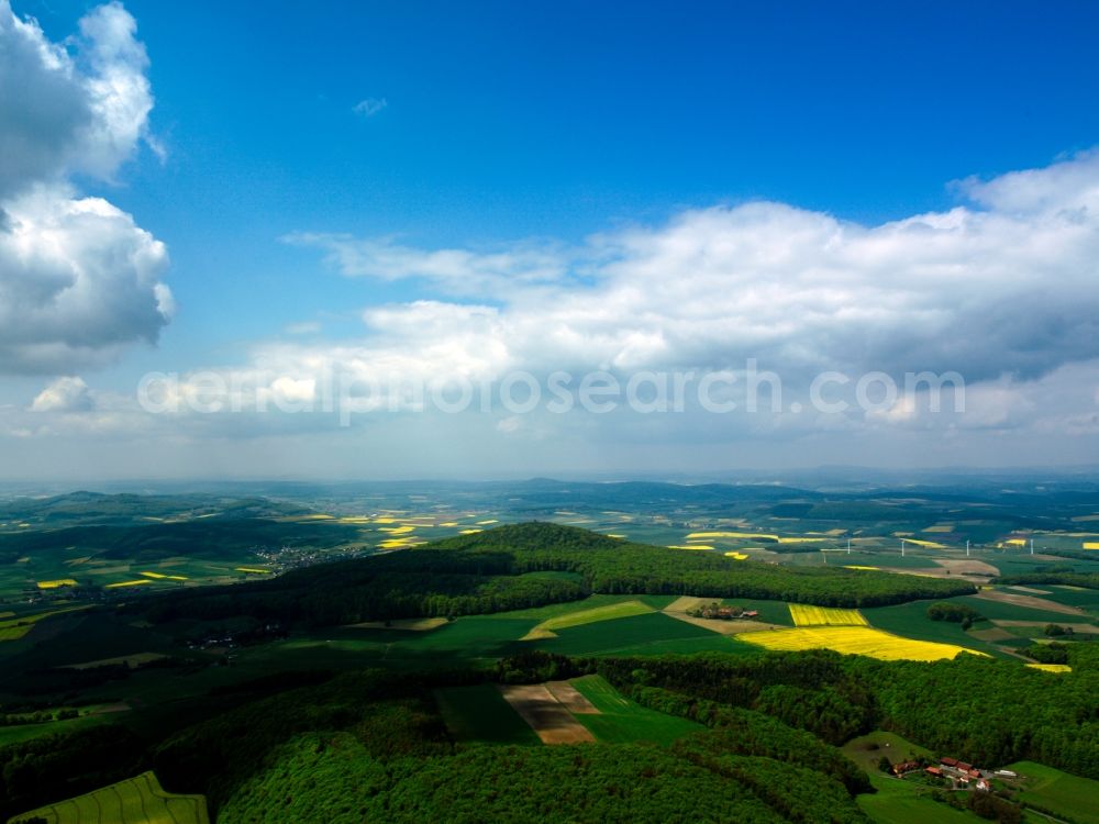 Aerial photograph Soislieden - The mountain Soisberg at Soislieden in the county districts of Hersfeld-Rotenburg and Fulda in the state of Hesse. The mountain is an extinct volcano in the mountain range of Rhön. It is surrounded by agricultural fields and is a tourism site