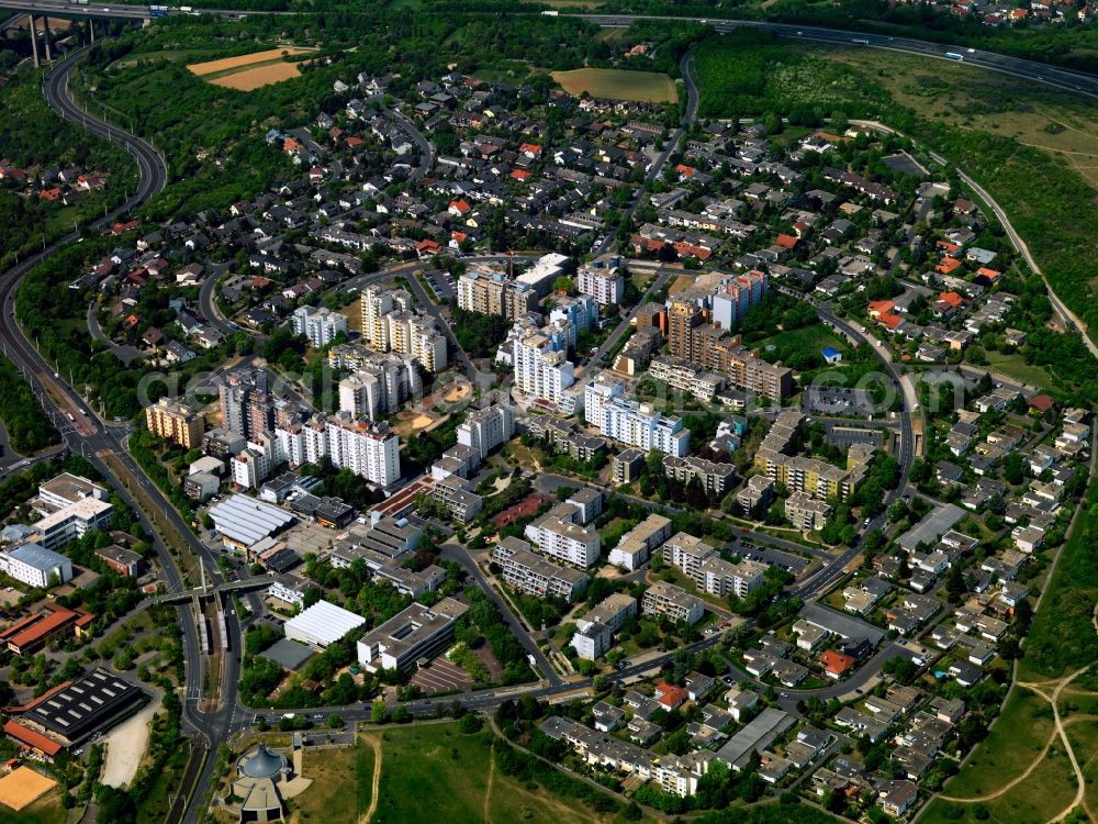 Aerial photograph Würzburg - The district of Heuchelhof in Würzburg in the state of Bavaria. Heuchelhof is the youngest part of the city. It is located on the Autobahn A3 in the South of the city. In its center, there is the Straßburger Ring road which encloses a residential block of towers around the Place de Caen