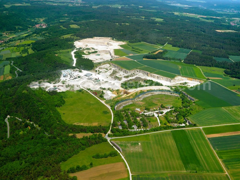 Gräfenberg from above - The quarry and stone pit at Mountain Gräfenberg in the Spessart area of the state of Bavaria. The mountain is a sandstone outlier that is surrounded by lime. The lime is being mined today, the sandstone was mined until World War II