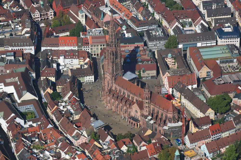 Freiburg im Breisgau from the bird's eye view: Church building Freiburger Muenster in the Old Town- center of downtown Freiburg im Breisgau in the state Baden-Wurttemberg, Germany. The steeple, after years of renovation, can now be seen without scaffold