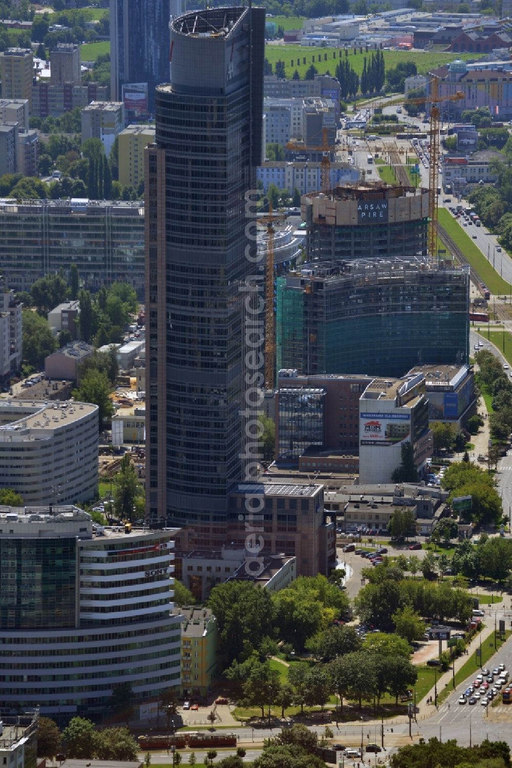 Aerial image Warschau - Warsaw Trade Tower in the Wola district of Warsaw in Poland. The skyscraper is an office building whose primary tenant is the insurance company AXA. Its logo is very well visible on the upper floors. The tower is over 200m high and has Europe's fastest elevator. It was completed in 1999 after two years of construction and is the second tallest building in Warsaw