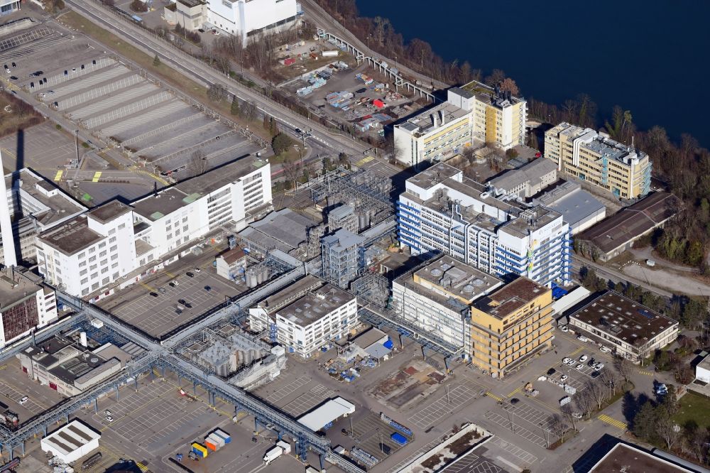 Aerial image Muttenz - Buildings and production halls on the premises of the industrial park Infrapark Baselland AG in Muttenz in the canton Basel-Landschaft, Switzerland