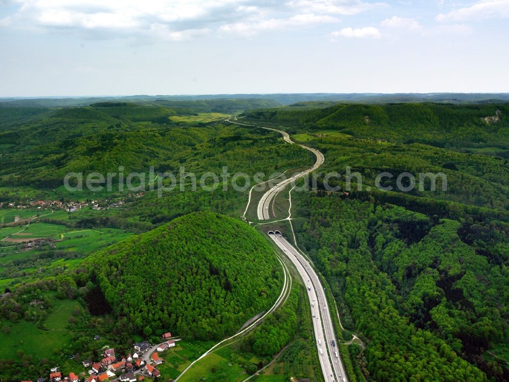 Aerial photograph Aichelberg - The federal motorway (Autobahn) A8 in Aichelberg in the state of Baden-Wuerttemberg. The federal motorway connects Luxembourg in the West with Austria in the East through Southern Germany. In the area of the district of Goeppingen around Aichelberg, the motorway runs through hills, bridges and forests of the Swabian Alb. This part of the motorway is also called Alb descent and ascent