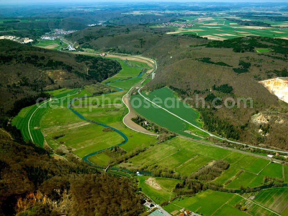 Blaustein from above - The river Blau (blue) in the Arnegg part of the county of Blaustein in the state of Baden-Württemberg. The river is a 14,5 km long left sidearm of the Danube. It runs through the area of the district between fields and woods. The valley has some good sports climbing sites and is one of the most interesting climbing areas of the Swabian Alps