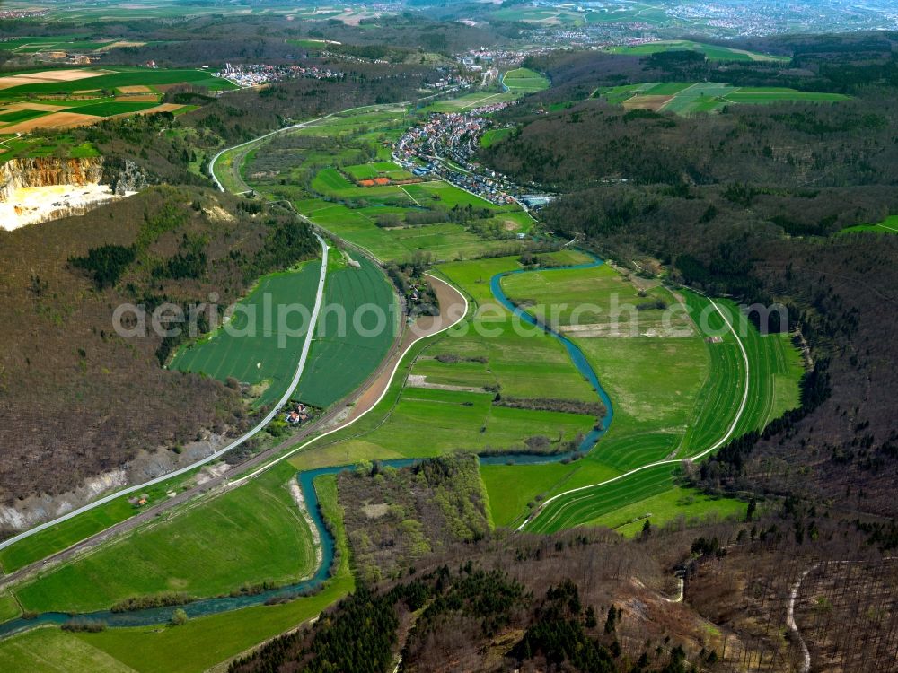 Blaustein from the bird's eye view: The river Blau (blue) in the Arnegg part of the county of Blaustein in the state of Baden-Württemberg. The river is a 14,5 km long left sidearm of the Danube. It runs through the area of the district between fields and woods. The valley has some good sports climbing sites and is one of the most interesting climbing areas of the Swabian Alps