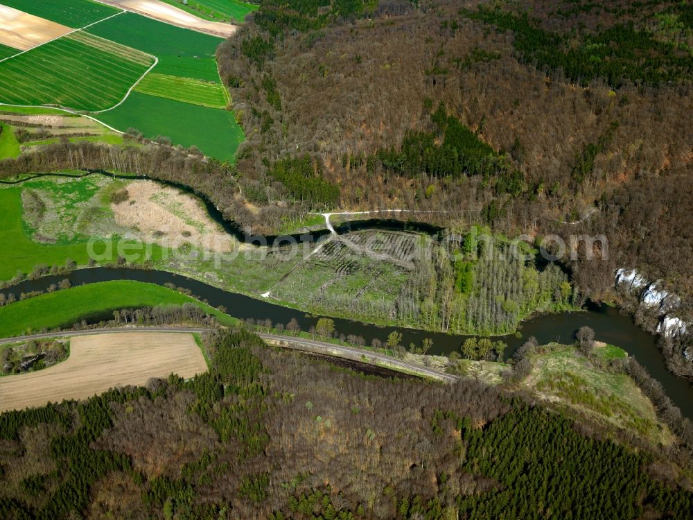 Aerial photograph Obermarchtal - The Danube in the county district of Obermarchtal in the Danube-Alb-Region in the state of Baden-Württemberg. The river runs here at the outerlimits of the Swabian Alb between hills and forests. After passing watergates and in main and side arms, the river runs South from here