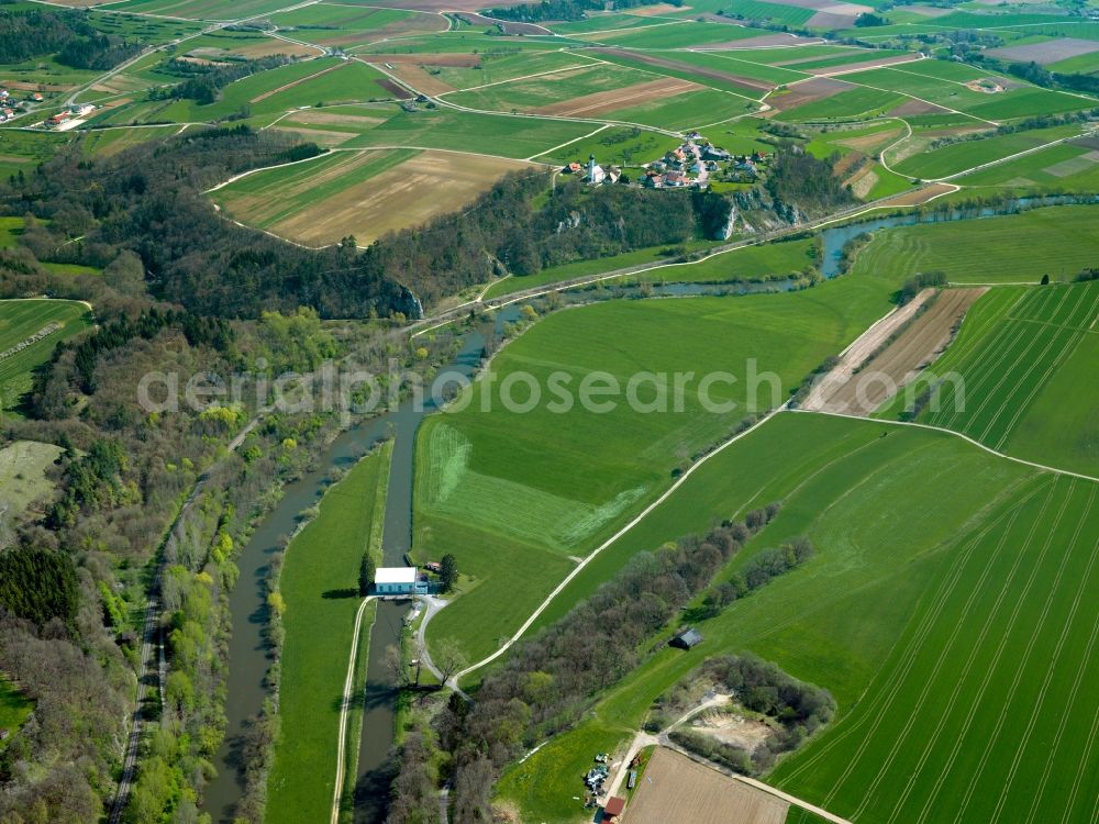 Obermarchtal from above - The Danube in the county district of Obermarchtal in the Danube-Alb-Region in the state of Baden-Württemberg. The river runs here at the outerlimits of the Swabian Alb between hills and forests. After passing watergates and in main and side arms, the river runs South from here